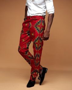 Bright color African print Men's  Pants made from Ankara fabric . PRODUCT DETAILS  -Straight Fit  -Belt Loop -Hidden fasteners -Fixed waistband -Side pocket -Poly-cotton                Model is wearing a Large   SEE SIMILAR ITEMS https://www.etsy.com/listing/709485019/ankara-mens-pants-african-mens-pants?ref=shop_home_active_22&frs=1 https://www.etsy.com/listing/789464713/ankara-mens-pants-african-mens-pants?ref=shop_home_active_29&frs=1 https://www.etsy.com/listing/709471743/ankara-mens-pants-a Printed Pants Men, Red Cotton Party Bottoms, Fitted Tapered Leg Summer Harem Pants, Fitted Tapered Leg Harem Pants For Summer, Fitted Summer Harem Pants With Tapered Leg, Fitted Multicolor Ankle-length Pants, Birthday Attire, Urban Clothing Men, African Pants