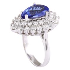 Stamped: 14K White GoldTotal Ring Weight: 9.3 GramsRing Length: N/ARing Width: N/AGemstone Weight: Total Natural Tanzanite Weight is 4.11 Carat (Measures: 13.55x9.40 mm)Color: BlueDiamond Weight: Total Natural Diamond Weight is 2.10 CaratColor: F-G, Clarity: VS2-SI1Face Measures: 24.17x19.03 mmSku: [703397W] Formal Pear-shaped Diamond Ring In Fine Jewelry Style, Fine Jewelry Pear-shaped Diamond Ring For Formal Events, Formal Fine Jewelry Pear-shaped Diamond Ring, Formal Gia Certified Pear-shaped Rings, Formal Pear-shaped Diamond Ring, Fine Jewelry Pear-shaped Sapphire Ring For Formal Occasions, Pear-shaped Sapphire Ring Fine Jewelry For Formal Occasions, Formal Pear-shaped Sapphire Ring In Fine Jewelry Style, Pear-shaped Sapphire Ring For Formal Occasions