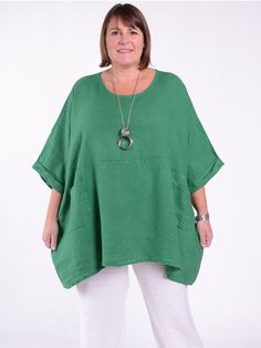 A Lagenlook Oversized Linen Tunic is a loose-fitting, comfortable top designed in the Lagenlook fashion style. It is made from quality Italian linen and features batwing sleeves and pockets!. The tunic is designed to be worn oversized and typically falls below the hips, making it ideal to pair with leggings or skinny jeans. It is a popular choice among those who value both style and comfort in their clothing. Beautiful Quality Italian Linen  Round Neck  Bat wing Sleeves  Front Pockets  100%  Qua Plus Size Linen, Wing Sleeves, Linen Tunic Tops, Lagenlook Style, Navy Blue Linen, Bat Wing, Linen Tunic, Comfortable Tops, Plus Size Kleidung