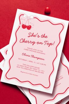 two cherry themed baby shower cards on top of each other