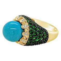 Carlo Viani® Ring featuring 9 1/5 cts. Robins Egg Blue Turquoise™, 3 1/6 cts. Forest Green Tsavorite™, 1/8 cts. Vanilla Diamonds® set in 14K Honey Gold™ Ring may or may not be sizable, please feel free to reach out with any questions! Item comes with a Carlo Viani® suede pouch! Luxury Green Multi-stone Emerald Ring, Fine Jewelry Green Diamond Ring With Gemstone Accents, Luxury Green Rings With Gemstone Accents, Green Diamond Ring With Gemstone Accents, Fine Jewelry Green Turquoise Ring With Gemstone, Fine Jewelry Green Turquoise Ring, Fine Jewelry Green Ring With Pave Setting, Luxury Green Emerald Ring With Gemstone Accents, Green Cabochon Rings Fine Jewelry