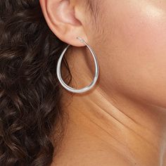 Add a sleek statement to your looks with the Sterling Silver Teardrop Hoop Earrings from A New Day™. These sterling silver hoop earrings feature a sleek design in a teardrop shape for a beautiful look. Designed with a hinge closure, these hoop earrings suit all types of skin with their nickel-free design. A New Day™: Style that goes wherever you do. Modern Sterling Silver Teardrop Earrings, Everyday Small Hoop Teardrop Earrings, Minimalist Teardrop Hoop Earrings, Sleek Sterling Silver Hoop Earrings, Teardrop Hoop Earrings, Types Of Skin, Sterling Silver Hoop Earrings, Sterling Silver Hoops, Jewelry Cleaner