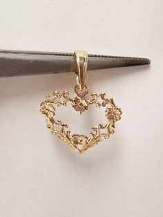 "Thanks for shopping our vintage estate store. We tend to sell well below wholesale and truly hope you enjoy all of our items. Many of the items are one of a kind, so please enjoy scrolling through the pictures and hopefully something will catch your eye. Estate 14k yellow gold Victorian heart flower pendant detailed beading. We also have listed ring that matches this pendant in another listing G12. Pendant Size: 3/4\" by 5/8\" Bail: 3mm Weight: 0.61 gram Marked 14k gold and is a beautiful penda Vintage Heart Pendant, Unique Gold Jewelry, Fantasy Earrings, Gold Heart Pendant, Gold Pendant Jewelry, Snake Jewelry, Heart Flower, Jewelry Accessories Ideas, Dope Jewelry