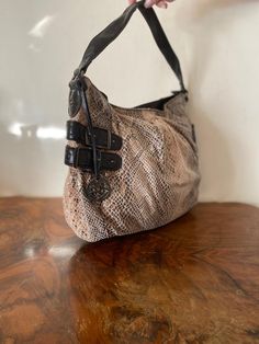 "Style and Co, Faux Leather Purse ,Snake skin fabric print, black, Tan, Shoulder Bag, Non Leather Beautiful soft fabric roomy purse Zip closures Lined w/1 zip pocket and 2 slip pockets PLEASE SEE MEASUREMENTS Measures: 15\" x 12\" x 5\" Strap: drop 8\" Excellent condition NK901DN Style and Co, Faux Leather Purse ,Snake skin fabric print, black, Tan, Shoulder Bag, Non Leather" Everyday Snake Print Satchel Bag, Leather Snake Print Satchel Shoulder Bag, Leather Satchel Shoulder Bag With Snake Print, Chic Leather Shoulder Bag With Snake Print, Chic Snake Print Shoulder Bag For Everyday Use, Snake Print Leather Tote Shoulder Bag, Leather Snake Print Tote Shoulder Bag, Leather Tote Shoulder Bag With Snake Print, Brown Leather Shoulder Bag With Snake Print