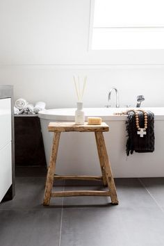 the bathroom is clean and ready to be used as a bathtub or shower stall