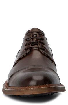 A classic cap toe brings a polished aesthetic to a contemporary derby made of supple leather. Lace-up closure Cushioned footbed Cap toe Leather upper and lining/rubber sole Imported Polished Aesthetic, Leather Lace, Chukka Boots, Vintage Shops, Nordstrom Rack, Derby, Rubber Sole, Dress Shoes Men, Oxford Shoes