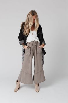 The ultimate comfy pants with the perfect boho style are the Feeling Good Wide Leg Pant! Never sacrifice style for comfort again because they feature: So comfy, mineral washed, terry knit fabric Wide leg silhouette High - rise, drawstring, elastic waistband Oversized, patch, side pockets Raw and exposed seam detailing throughout for added boho style Comfy and cute boho outfit pair with: Eye Of The Sun Padded Bralette, Lenny Off The Shoulder Top, Chantel Beaded Bracelet Set *Due to lighting and d Relaxed Bottoms With Drawstring For Fall, Relaxed Drawstring Bottoms For Fall, Stonewashed Cotton Bottoms For Fall, Soft-washed Pants For Spring Loungewear, Soft-washed Pants For Fall Loungewear, Fall Loungewear Soft-washed Pants, Soft-washed Loungewear Pants For Fall, Bohemian Wide-leg Drawstring Pants, Bohemian Wide-leg Pants With Drawstring