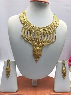 "Handmade Indian Bridal Wedding Jewelry 22ct Heavy Gold Plated Necklace Set with Earrings Indian Jewelry Indian Bollywood Jewelry , its Artificial Jewelry  Type :22ct Gold Plated Necklace Set Earrings Length: 2.5\"inches Approx Shape - As Shown in Picture It is a perfect match with formal attire on special occasions or with casual wearing The item will come with the clear plastic box or plastic bag and packaging Traditional Indian Wedding Jewellery Slight Colour variations possible due to differ Gold Chandbali Jewelry Sets Hand Set, Gold Temple Necklace For Marriage And Festivals, Traditional Gold Temple Necklace For Marriage, Gold Temple Necklace For Marriage And Festive Occasions, Gold Bridal Necklace For Marriage And Diwali, Gold Kundan Necklace For Marriage, Gold Chandbali Jewelry Sets For Marriage, Gold Chandbali Bridal Set For Marriage, Traditional Gold Jewelry Sets For Marriage