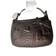 Brighton Brown Leather Shoulder Bag Hearts & Bows Nwt $190.00. E272350. Zip Closure, Animal Print Liner. Zip Compartments, 2 Pouches, Key Chain Inside, Chain Strap, 21" Long, 10" Arm Hole. Medium Size Bag. New With Tags. Very Mod, Great For Going Out And Holiday Party Season! 7718-67 Everyday Use Heart-shaped Leather Shoulder Bag, Leather Shoulder Bag With Detachable Strap For Valentine's Day, Heart-shaped Leather Evening Shoulder Bag, Chic Heart-shaped Leather Bag, Evening Heart-shaped Leather Shoulder Bag, Leather Heart-shaped Bag With Detachable Strap, Leather Shoulder Bag For Valentine's Day Evening, Leather Shoulder Bag For Evening And Valentine's Day, Valentine's Day Leather Shoulder Bag For Evening