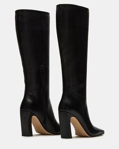 Expertly constructed, the LIZETTE boot is designed with a sleek knee-high silhouette, square toe, and stylish heel. This boot is durable and fashionable, making it the perfect addition to any wardrobe. Elevate your look with these timeless boots. 3.5 inch heel height Size 6 measurements: 14.5 inch shaft circumference, 14 inch shaft height Size 8 measurements: 16 inch shaft circumference, 14.5 inch shaft height Size 10 measurements: 16.75 inch shaft circumference, 15 inch shaft height Leather upp Timeless Boots, Stylish Heels, Fashion Aesthetics, Leather Wear, All About Shoes, 5 Inch Heels, Elevate Your Look, Black Heels, Knee High Boots