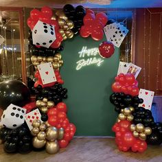 a casino themed birthday party with balloons and decorations