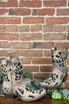 WIDE Brown and Crystal & Sequin Ankle Boot by Corral Boots This gorgeous ankle bootie now comes in a wide width! Sophisticated, elegant, and stunning. The vintage vibe of the design, and the boot color complement well with the black glitter inlay and carefully placed crystals.You can wear this style all day without worrying about getting tired. It features; sturdy pull-on straps and an elegant snip toe. The smooth inside leather lining, cushioned leather insole, leather outer sole scream comfort Curvy Girl Dress, Corral Boots, Maui Jim Sunglasses, Cc Beanie, Jag Jeans, All American Girl, Fall Denim, Color Complement, Vintage Vibe