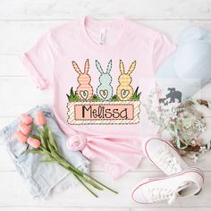 "Personalized Easter Shirt for Girls and Boys,Easter Kids Shirt,Custom Easter Shirt,Easter Bunny Shirt,Easter Toddler Shirt, Cute Kid Clothes 🐰 Style your little one with the cutest customized Easter Shirt! 🐰 *UNISEX SIZING - Tees and Sweatshirts are unisex, relaxed/loose fit *FAST SHIPPING from Florida, USA! *Shop with Confidence!  Infant and Toddler ASH, LIGHT BLUE, PEACH, LAVENDER will be Rabbit Skins brand.  HOW TO ORDER MULTIPLES: 1. Select your size in the drop down menu. 2. Click Add to Cart, then go back and repeat for each shirt. SHIPPING: We have the fastest handmade Production time! Most items ship within 3-5 business days (see each listing's \"Estimated arrival\" section for more precise info! Need it faster? Select PRIORITY Shipping at checkout and your order will be made & Cute Spring Shirt With Name Print, Cute Kid Clothes, Funny Easter Shirts, Easter Shirts For Kids, Pink Short Sleeve T-shirt For Easter, Easter Toddler, Pink Cotton T-shirt For Easter, Playful Short Sleeve T-shirt For Easter, Peach Lavender