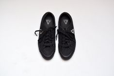 Vintage black canvas and rubber lace up sneakers in excellent condition. Brand Le Coq Sportif Size 37 (us 5, uk 4, jpn 23.5) Made in Thailand Canvas uppers Rubber sole and toes Laces insole 23.5 cm = 9.3 in ball width 7.5 cm = 3 in Black Urban Cotton Skate Shoes, Black Canvas Shoes For Skateboarding, Black Lace-up Canvas Shoes With Rubber Waffle Outsoles, Black Sporty Canvas Shoes With Gum Sole, Sporty Black Canvas Shoes With Gum Sole, Black Cotton Sneakers With Gum Sole, Everyday Black Canvas Sneakers, Black Canvas Shoes With Rubber Waffle Outsoles, Black Canvas Sports Shoes