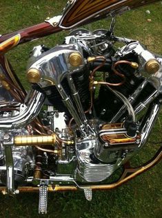 an image of a motorcycle engine on the grass