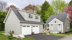 two garages are shown in front of each other on the same side of the house