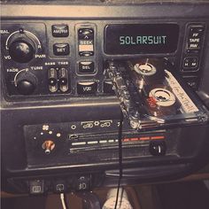 an old radio sitting on top of a table