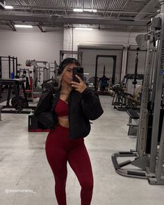 @jessmoreno__ is layered up with her coat in the gym this winter