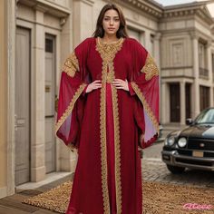 Qteee - Lavish Embroidered Gown with Bell Sleeve and Exquisite Golden Lace Trim Red Floor-length Wedding Abaya, Red Floor-length Abaya For Wedding, Red Embroidered Maxi Length Gown, Red Embroidered Long Sleeve Abaya, Red Embroidered Long Abaya, Elegant Red Embroidered Abaya, Red Long Sleeve Gown For Eid, Long Sleeve Red Gown For Eid, Elegant Red Floor-length Abaya