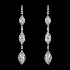 CZ Drop Earrings in Silver or Gold Add a glamorous touch to your special day with these stunning cz earrings. These dazzling Cubic Zirconia statement earrings will be an elegant addition to your wedding day, prom, quinceanera or pageant! These silver or gold plated drop cz earrings feature dazzling AAA quality CZ crystals in a beautiful drop design. Size: 3.45" long. Color: Silver or Gold. Style: EME4432. Need several pair of earrings for your bridal party or damas? You can buy in bulk and save. Winter Wedding Accessories, Gold Bridesmaid Jewelry, Drop Bridal Earrings, Pendulum Earrings, Silver Bridal Earrings, Prom Fashion, Formal Earrings, Prom Accessories, Bridesmaid Pearls