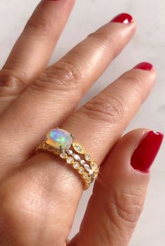 You will be mesmerized each time you gaze into this rainbow filled opal ring! Since it sits up, it's perfect for stacking as ring fit perfectly next to it. I choose each opal one by one so they are all filled with rainbows. All opals will look similar are they are from the same mine pocket. Natural Ethiopian opal Solid .925 sterling silver Nickel-free for sensitive skin Sizes 6-9 Ammolite Ring, Fossil Ring, Herkimer Diamond Ring, Prong Ring, Opal Band, Rainbow Opal, Sterling Silver Stacking Rings, Silver Stacking Rings, Purple Labradorite