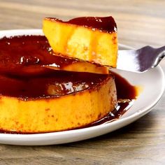 two pieces of cake sitting on top of a white plate