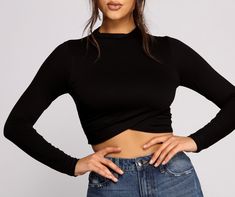 Be a total stylish stunner in this chic crepe knit crop top! Featuring a high neckline. a cropped tulip hem and a form-hugging fit. this top would pair perfectly with high waist denim and heeled booties. Make this part of your new fall wardobe!Fit & Features High neckline Long fitted sleeves Cropped tulip hem Form-fitting style Crepe knit fabric Moderate stretch Spring Cropped Fitted Mock Neck Top, Fitted Cropped Mock Neck Top For Spring, Trendy Fitted Mock Neck Top For Night Out, Casual Stretch Mock Neck Cropped Top, Casual Stretch Cropped Mock Neck Top, Fitted Casual Cropped Mock Neck Top, Fitted Mock Neck Top For Night Out In Spring, Trendy Slightly Cropped Fitted Top, Trendy Fitted Mock Neck Top For Spring