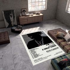 a living room filled with furniture and a large poster on the wall