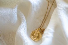 This locket necklace features a charming flower design and a flat circular shape. It serves as a keepsake for your most treasured memories, allowing you to insert a photo within it. Talk about a perfect gift idea! * How To Order 1. Choose the size. 2. Select initials, if you do not want any initial, select "NONE" (UPPER CASE and HEART Shape Available) if you want LOWERCASE please message me BEFORE placing the order!) 3. Add to cart and submit order :) * Locket : Photo Frame Pendant, Flat Round w Vintage Charm Initial Pendant Necklace Gift, Initial Pendant Necklace With Vintage Charm As Gift, Vintage Initial Pendant Necklace For Gifts, Vintage Charm Medallion Necklace For Gift, Dainty Medallion Locket Necklace For Keepsake, Vintage Necklace With Charms For Personalized Gift, Dainty Medallion Locket Necklace As Keepsake, Dainty Medallion Pendant Necklace For Gift, Keepsake Medallion Locket Necklace With Hallmark