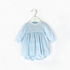 Introducing the Baby Girl Long Sleeve Dress! This beautiful dress is perfect for any special occasion. It is machine washable, so it is easy to care for. The 100% cotton fabric is soft and comfortable, and the hand embroidered pin-tucked design and lace collar add a special touch. The long puffy sleeves and sash in the back make this dress easy to put on and take off, so your little one can be comfortable all day long. The buttons in the back also make it easy to dress up or down depending on your child's needs. Whether you are dressing up for church or just dressing up for fun. This long sleeve dress is the perfect choice! Classic Cotton Dress With Lace Collar, Spring Baptism Dress With Lace Collar, Blue Dresses With Lace Collar For Daywear, Light Blue Fitted Cotton Smocked Dress, Light Blue Cotton Dress For Baptism, Light Blue Cotton Dress With Smocked Bodice, Cotton Dress With Lace Collar For Baptism, Blue Cotton Dress For Baptism, Blue Cotton Smocked Dress