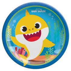 a baby shark paper plate with an image of a fish on it's side