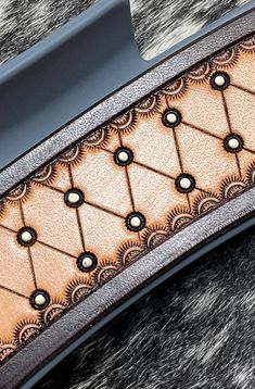 a close up view of a leather belt