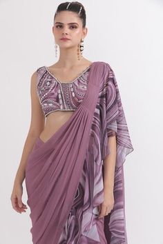 Dusky lilac georgette pre-draped saree with marble printed ruffled detailing. Comes with a padded blouse with pearls and sequins hand embroidery. - Aza Fashions Draped Blouse With Ruffles, Purple Party Pre-draped Saree With Cutdana, Luxury Purple Self-design Pre-draped Saree, Purple Embellished Pre-draped Saree In Georgette, Embroidered Purple Georgette Pre-draped Saree, Purple Embellished Georgette Pre-draped Saree, Ruffle Saree, Drape Saree, Marble Print