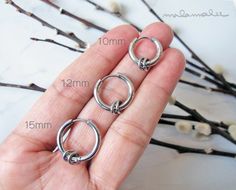 * Surgical Stainless Steel Huggie Hoop earrings with small rings. Round Huggie Hoop.  Men's Hoop Earrings.* This listing is for 1 piece -or 2 pieces (choose from drop down menu)* These earrings are made of 316L surgical steel. * Dimensions :       Diameter:   Choose from                    -Inner 10 mm / Outer 13 mm    -or-                    -Inner 12 mm / Outer 16 mm    -or-                    -Inner 15 mm / Outer 18 mm     Thickness:     2.5 mm     Post Gauge:     18G (1mm) standard piercing* Rings Mens, Black Hoops Earrings, Mens Earrings Hoop, Cartilage Hoop, Surgical Steel Earrings, Steel Earrings, Cz Earrings, Small Rings, Star Studs