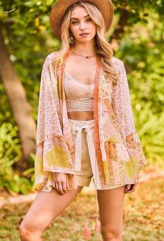 100% Polyester; This beautiful boho ruffle sleeve kimono will be your most versatile piece this season. Wear it over a tank dress with sandals or alone over your swimsuit. You can even pair this flowy separate with shorts and a bralette for a perfect feminine touch! Chic V-neck Summer Kimono, Bohemian Lightweight Cover-up For Day Out, Flowy Hippie Summer Cover-up, Summer Bell Sleeve Kimono, Casual Spring Cover-up With Kimono Sleeves, Spring V-neck Beachwear Kimono, Summer Beachwear Cover-up For Brunch, Summer Kimono With Kimono Sleeves For Brunch, Hippie Open Front Kimono For Spring