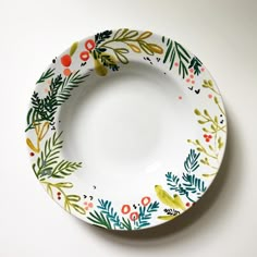 a white plate with colorful designs on it