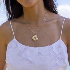 The Plumeria line is inspired by exotic Plumerias which are found blooming on every Hawaiian Island. Evoke the unique fragrance found in these beautiful blossoms and rediscover memories in Paradise with our Plumeria Collection. Plumeria Design Pendant 14k Yellow Gold 28mm Natural Diamond: 0.175 CTW Chain not included, Shop Chains Now Exclusively Made in Hawaiʻi Forever Guarantee (Warranty on the life of the piece) Free Shipping on USA Orders $100 or more Plumeria Design, Faith Love, Unique Fragrance, Hawaiian Islands, Pave Diamonds, Satin Finish, Natural Diamonds, Paradise, Fragrance