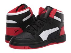 PUMA Kids Rebound Layup Sl (Big Kid) - Kid's Shoes : Puma Black/High Risk Red/Puma White : The Puma Kids Rebound Layup Sl sneaker gives off an old-school vibe with its high-top design in a faux-leather upper. Lace-up closure. Brand logo detail at tongue and back. Round-toe construction with perforated detail at vamp. Soft fabric lining. Softfoam sockliner provides comfort and cushioning. Rubber outsole. Imported. Measurements: Heel Height: 1 1 10 in Weight: 10.8 oz Platform Height: 4 5 in Produc Puma High-top Skate Shoes For Sports, Puma Logo High-top Leather Sneakers, Casual Puma High-top Sneakers For Streetwear, High-top Leather Puma Sneakers, Leather High-top Puma Sneakers, Leather Puma Skate Shoes For Streetwear, Casual High-top Skate Shoes With Puma Logo, Casual High-top Puma Sneakers, Puma Basketball Shoes With Round Toe