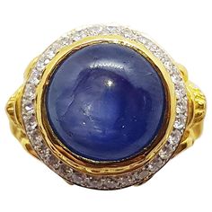 Blue Star Sapphire 12.76 carats with Diamond 0.49 carats Ring set in 18 Karat Gold Settings Width: 1.9 cm Length: 1.9 cm Ring Size: 53 Total Weight: 23.32grams "We first opened doors in 1980 when it was then situated in the vicinity of the Victory Monument; a small and modest storefront with a couple of counters. From its humble beginnings to where it stands today, our company has proven its abilities as a jeweler. Since the beginning, we have been supplying fine quality pieces to dealers, whole Blue Star Sapphire, Star Sapphire, Diamond Ring Settings, Sapphire Diamond Ring, Blue Star, Sapphire Diamond, Ring Sets, Monument, Diamond Ring