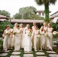 a group of women standing next to each other