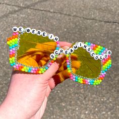 I Handmade These Yellow Sunglasses With Rainbow And Crystal Rhinestones And Embellishments. They Read “We Were In Screaming Color” And Are One Of A Kind! Taylor Swift Inspired, Yellow Sunglasses, Rhinestone Sunglasses, Pride Parade, Accessories Handmade, Burning Man, Orange Yellow, Yellow Color, Scream