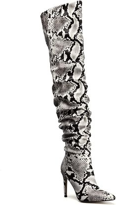 Look no further for designer style at an affordable price. These snakeskin printed stiletto over the knee boots feature stunning printed designs and the perfect heel height for long-lasting comfort. Elevate your style with these stylish boots. Rubber sole Shaft measures approximately 59 centimeters from arch Designed for the modern fashionista, these boots combine the perfect blend of sexy allure and fashion-forward elegance. Crafted with a snakeskin texture, these boots embrace the latest Snake Skin Boots, Pu Boots, Perfect Heels, Ankle Dress, Pointed Toe Boots, Slouched Boots, Stylish Boots, Boot Accessories, Designer Style