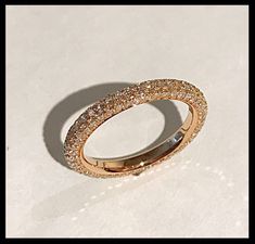 This is Bespoke, Made To Order, Handmade to fit. Handmade and Custom-Sized for a Perfect Fit. This uniquely beautiful all-around wedding ring band is pictured in 18k Rose Gold with micro-pave bright cut diamonds. These alluring stones are set on all three sides of the band. 18k Rose gold weight: 3.3 dwt. Natural round white diamonds GiA: 1.3mm; 45 Diamonds stones + 1.2mm 90 Diamonds stones = 135 stones Total carats weight: 1.15 cr. + Quality: G/ vs1 For custom orders price may vary depending on Rose Gold Diamond Ring With Pave Setting, Luxury Rose Gold Diamond Eternity Band, Luxury Rose Gold Round Eternity Band, 14k Rose Gold Pave Setting Wedding Rings, Luxury Rose Gold Eternity Band For Anniversary, Luxury Rose Gold Eternity Band For Formal Occasions, Rose Gold Round Cut Eternity Band With Halo, Rose Gold Halo Round Cut Eternity Band, Formal Rose Gold Eternity Band