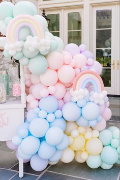 a bunch of balloons that are on the ground