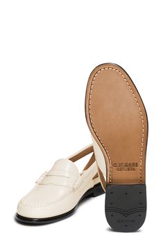 Enjoy breezy warm-weather styling in this leather penny loafer designed with side cutouts for an almost-sandal look. Leather upper, lining and sole Imported Classic Cream Closed Toe Loafers, Classic Beige Closed Toe Loafers, Beige Classic Closed Toe Loafers, Classic Cream Loafers For Business, Classic Closed Toe Loafers For Summer, Classic Slip-ons For Business In Summer, Classic Cream Loafers With Rubber Sole, Classic Summer Loafers With Round Toe, Classic Beige Moccasins With Rubber Sole