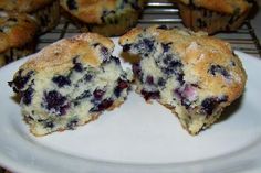 blueberry muffins cut in half on a plate