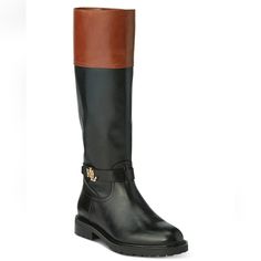 Item: Lauren Ralph Lauren Women's Leather Everly Riding Boot Black/Tan Calf 6b New Size: 6b Features: -Lauren Ralph Lauren Everly Riding Boot -Two-Tone Upper -Metal Logo Hardware At The Ankle -Rounded Toe -Inside Zip Closure -Textile Lining And Synthetic Insole -Man-Made Lug Sole Provides Traction Condition: New With Defect Sorced From A Shoe Bin. May Have Slight Scuffs Measurements: Heel: 1.5" Platform: .5" Let Us Know If You Have Any Questions! Brown Office Boots With Buckle Closure, Black Leather Boots With Leather Backing, Brown Flat Heel Boots For Office, Black Leather Boots With Leather Trim, Elegant Brown Boots With Flat Heel, Elegant Brown Flat Heel Boots, Brown Leather Trim Boots For Fall, Brown Calf Leather Boots With Flat Heel, Leather Trim Round Toe Boots For Work