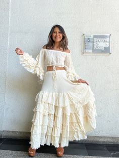 Bohemian ruffle maxi cream skirt with un finish hem on each layer. Elastic waist 100% raw cotton. Lined. Color Cream and White Can be worn both side to the front. (last photo) Measurements: Top Sleeves long 20 in. Bottom sleeve width 18 in. Bust 30 up to 44 in around. Length 12 in. Measurements: Skirt. Waist. 25 up to 42 inches. Hip. up to 52 inches. (measure from the inside lining) Length. 37-38 inches. (The end of the skirt is circle so the length can not be exact event and it hand trim so tha White Maxi Dress With Ruffled Skirt, Spring Wedding Maxi Skirt With Ruffles, White Tiered Maxi Dress With Ruffled Skirt, Beige Flowy Tiered Skirt Dress, Flowy Maxi Skirt With Ruffles, Beige Tiered Flowy Dress, Beige Tiered Dress With Flowy Skirt, Beige Flowy Tiered Dress, White Maxi Dress With Ruffled Tiered Skirt