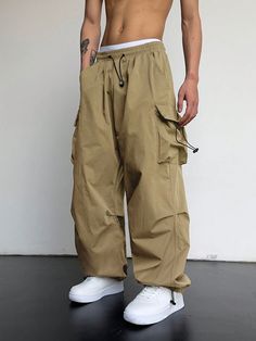 Men Solid Flap Pocket Drawstring Waist Oversized Cargo Baggy Pants Khaki Casual   Fabric Plain Cargo Pants Non-Stretch  Men Clothing, size features are:Bust: ,Length: ,Sleeve Length: Oversized Pants Men, Oversized Pants Outfit, Brown Baggy Cargo Pants, Baggy Khaki Pants, Baggy Cargo Pants Men, Cargo Pants Baggy, Big Backpacks, Long Sleeve Collared Dress, Baggy Cargo Pants