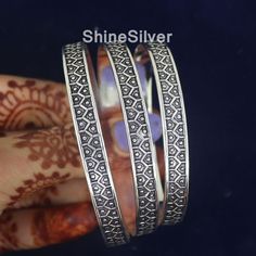 Oxidized Silver Bangle, West Indian Silver Bangles, Set Of 3 Bangles, Set Of Bangles, Anniversary  Bangle, Wedding Jeweler, Boho Jewelry This is a great item to collect for all occasions. If you would like a number combination not listed please contact us. Sizes are as follows: ---------------------------------- To measure your hand for the bangle fold your fingers into your hand as though you were putting a bangle on and measure at the widest part. Please look at the photo of how to measure and Bohemian Round Cuff Bracelet For Weddings, Bohemian Stackable Wedding Bracelets, Oxidized Finish Bracelets For Wedding And Festivals, Oxidized Finish Wedding Bracelets, Oxidized Wedding Bracelet, Spiritual Engraved Bangle For Wedding, Spiritual Engraved Bangle For Weddings, Spiritual Engraved Wedding Bangle, Adjustable Bohemian Bangle For Anniversary